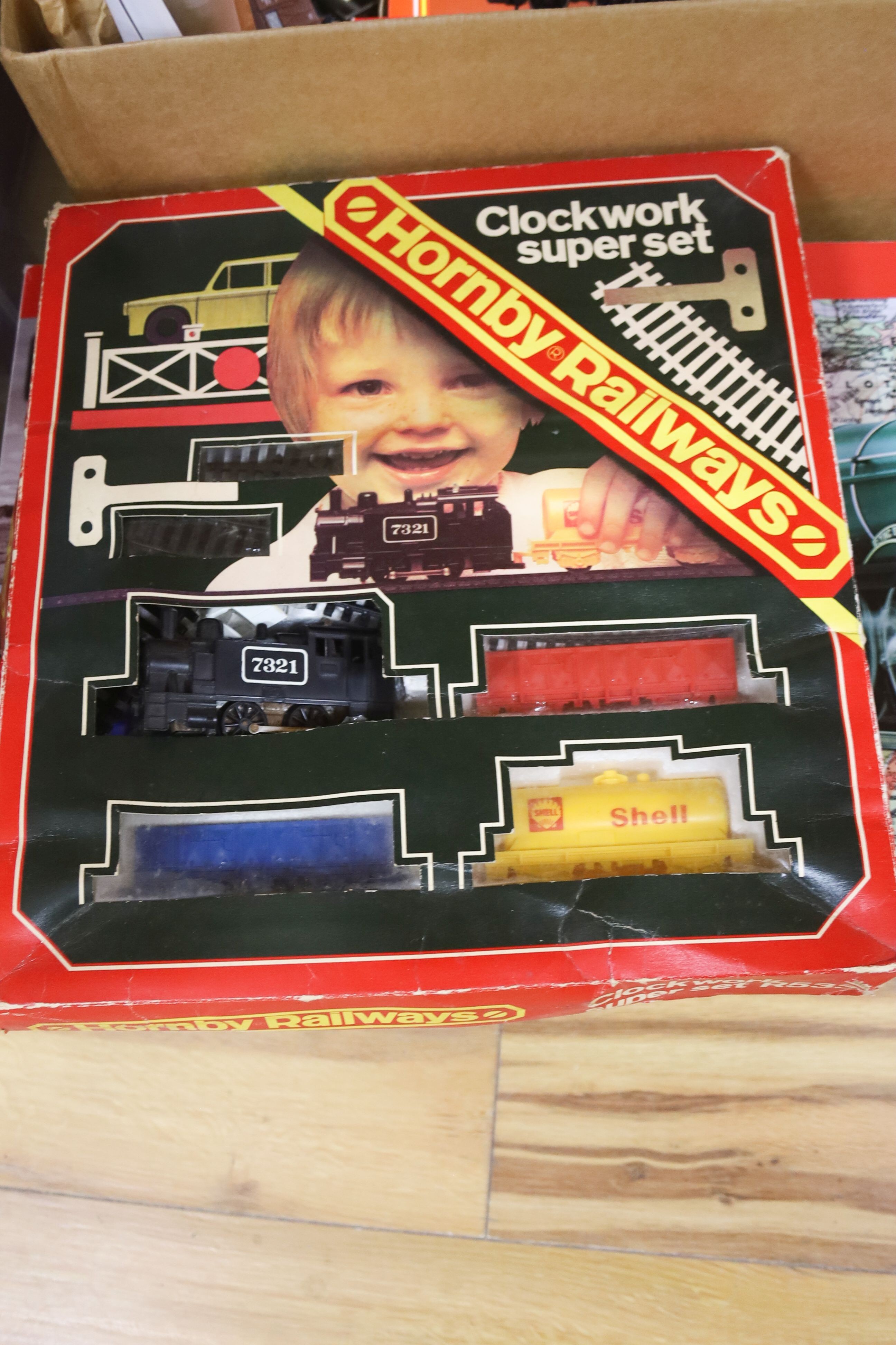 A mixed quantity of Hornby train sets etc including the flying Scotsman, building models, track etc.